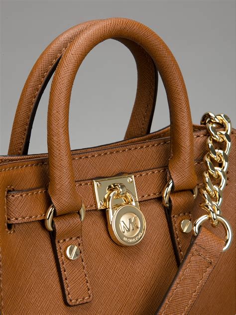 michael kors dark brown handbag|Michael Kors brown shoulder bag.